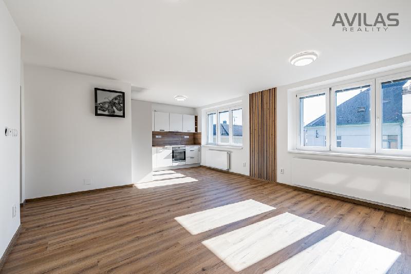 Prodej bytu 4+kk 108,5 m2 s terasou 23 m2 a samostatnou garáží 23 m2 nedaleko centra města Benešov - foto 1 z 10